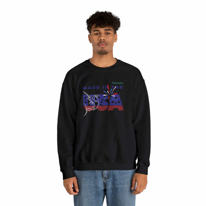 Fishing sweatshirt color black, context male model.  Front is designed with the text 'made in the USA' in US flag colors, with a Marlin fish white print on it. Brand logo in Plankton Green above the design, on the left side.